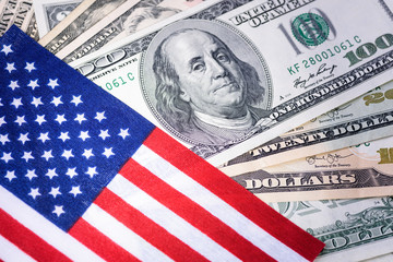 American flag on hundred dollar bill background. Financial concept. Money, cash background.