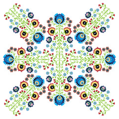 Colorful Polish folk inspired traditional floral cutout patterns made in the region of Lowicz in Poland 
