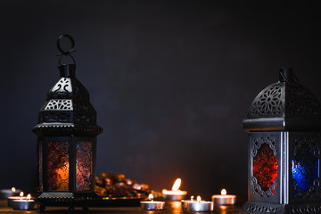 The Muslim feast of the holy month of Ramadan Kareem. Beautiful background with a shining lantern...