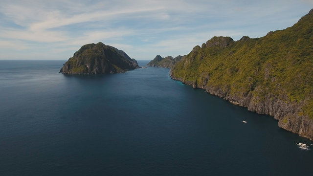Tropical islands, aerial view. Aerial view: sea and the tropical islands. Tropical bay in El Nido. Archipelago El Nido.Sandy beaches of the wild islands. Philippines National Marine Park. Seascape