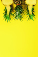 Pattern with bright pineapples on yellow background. Top View. Copy Space. Minimal style. Pop art...