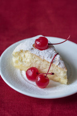 Slice of cheesecake on the white plate