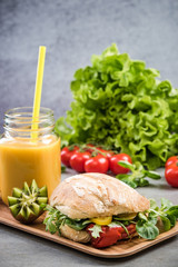 Healthy sandwich bun,smoothie on breakfast tray