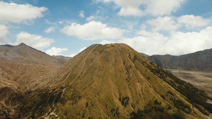 Fototapeta na wymiar Volcano in the mountains in East Jawa, Indonesia. Aerial view of volcano crater,Tengger Semeru National Park.