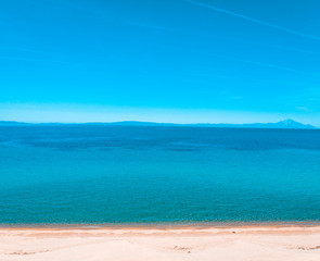 Sandy beach with turquoise blue ocean