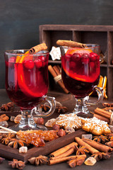 Winter  hot drink with spices and tasty cookies