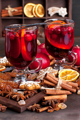 Mulled wine with slice of orange and spices
