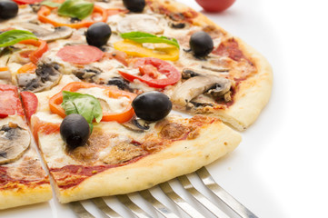 Pizza with ham, pepper and olives