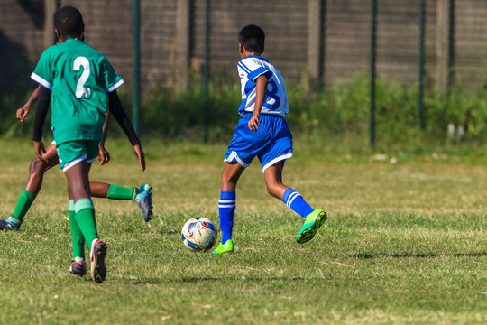 Football Soccer Junior Players Ball Action