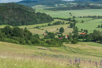 A view of the Eastern Ridge of the Kaczawskie Mountains belonging to the Western Sudetes. In the valley, the village of Świdnik - Poland, Lower Silesia.