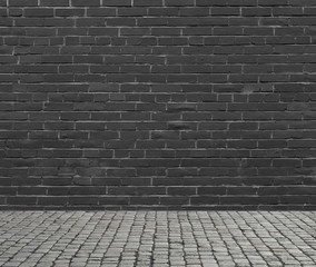 Black brick wall and floor.