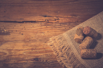 Bunch of wine corks on wooden table