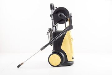 Yellow high pressure washer on white background