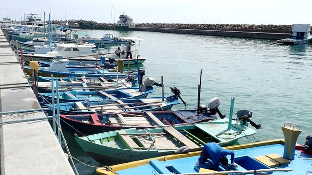 Fishing boats are in the harbor - Fuvahmulah island, Indian Ocean, Maldives
