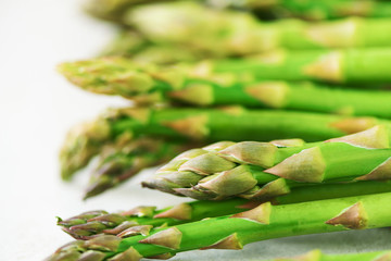 Close up of fresh asparagus. Clean and healthy eating concept. Macro texture of asparagus. Selective focus.