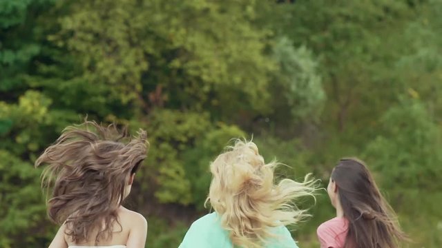 Happy Girls Friends Having Fun, Running Outdoors In Nature.