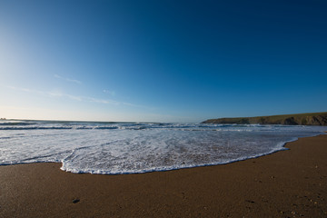 Slow waves on a sandy beach