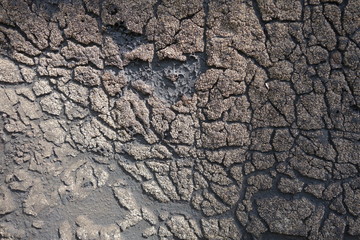 Fototapeta premium Old felt roofing tar fragment as an abstract background