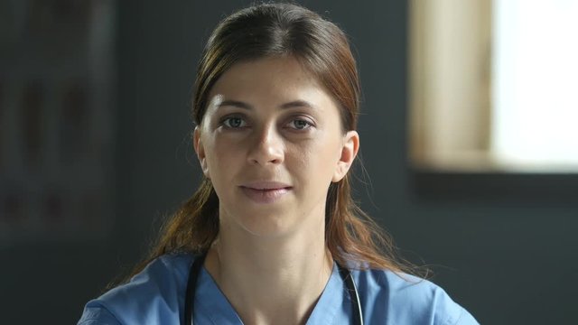 Health professional smiling, close up