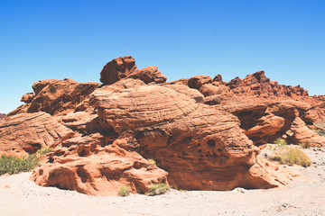 Fototapeta na wymiar Red rocks in a desert of the United States of America