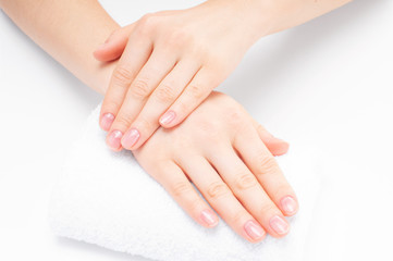 Fototapeta na wymiar Beautiful woman hands. Spa and manicure. Soft skin, the concept of nail care.