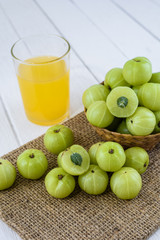 Indian gooseberry on wooden table