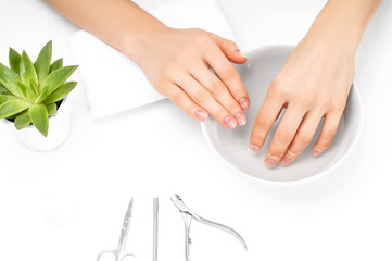 Naklejka premium Beautiful woman hands. Spa and manicure. Soft skin, the concept of nail care.