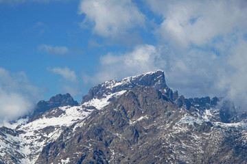 View of the snowcapped Monte Cinto 2706 masl, the highest mountain on the island of Corsica, France, Europe