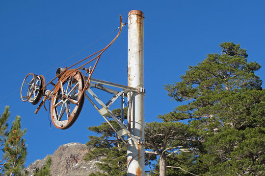 Old rusty pillar of an abandoned skilift in the Ese valley, Corsica, France, Europe