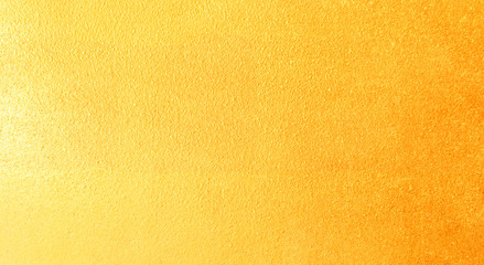 Fototapeta premium Shiny yellow leaf gold foil texture