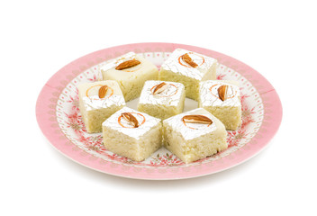 Indian Sweet Food Badam Barfi Also Know As Mithai, barfee, Mawa Barfi, Mava barfi, Almond Sweet, khoya Burfi Indian Popular Sweet Made up of Coconut, Mawa, Milk and Sugar isolated on white background