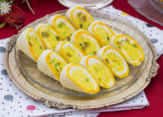 Indian Sweet Food Barfi Also Know as Dry Fruits Sweet, Mithai, barfee, Mawa Barfi, Mava barfi, khoya Burfi, orange and yellow barfi Indian Popular Sweet Made up of Coconut, Mawa, Milk and Sugar