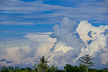 The white clouds clearly visible in the blue sky.