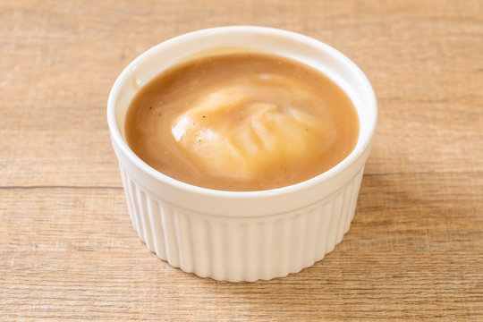 Fototapeta mash potatoes in gravy soup