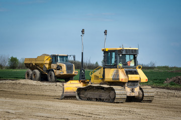 Obraz na płótnie Canvas Vehicles on a construction site
