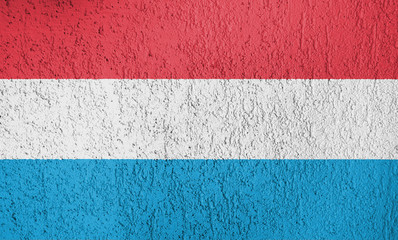 Texture of  Luxembourg flag on the wall of the plaster. 