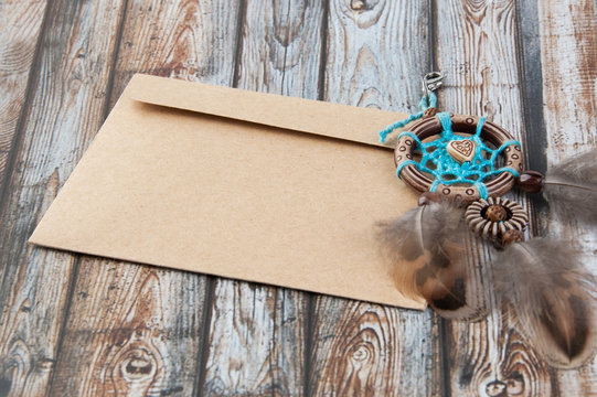 Handmade dream catcher and kraft envelope