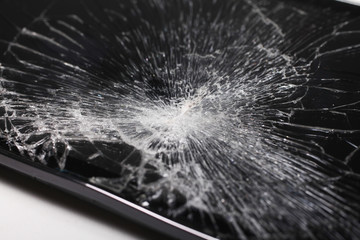 Black broken phone on white background