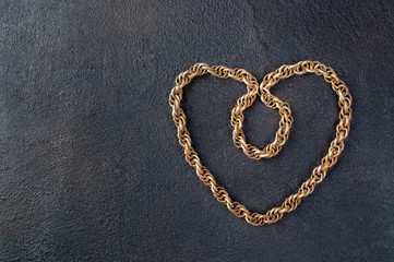 Vintage wooden necklace on black background