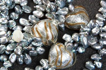 Vintage pearl necklace on black background