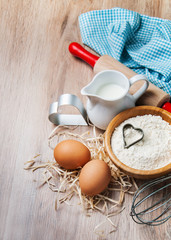 Baking ingredients - flour, eggs and pin