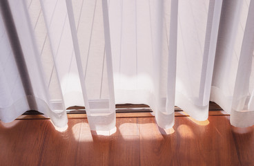 Curtain glazed sliding doors with wood flooring, background curtain, shadow through the curtain