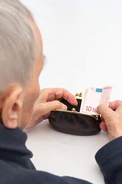 Old Woman Holding Empty Wallet