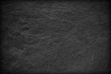 Dark grey black slate background or texture.