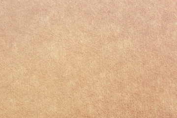 Fototapeta na wymiar Rough paper texture - brown paper sheet.
