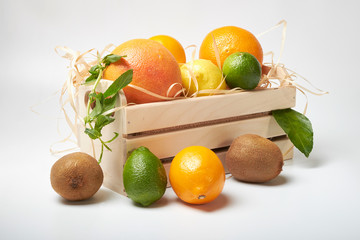 Fototapeta na wymiar fruits, vitamins, natural, fresh products, oranges, KIWI, summer juice, lime, mint, drink, lemonade