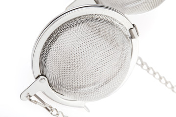 Two tea mesh on a chain on a white background.