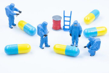 pharmacist scientists check quality drug capsule
