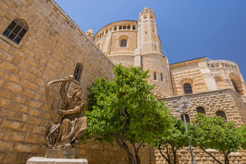 King David of Israel playing the harp. Statue located near the entrance to the king David's Tomb on...