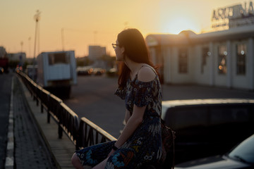 Portrait of beautiful girl on sunset